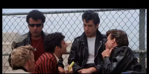 John Travolta and his friends from the film grease wearing stylish clothes