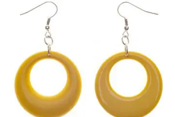 Retro Modern Yellow Plastic Earrings. Isolated on White with a Clipping Path. 80s style earrings.