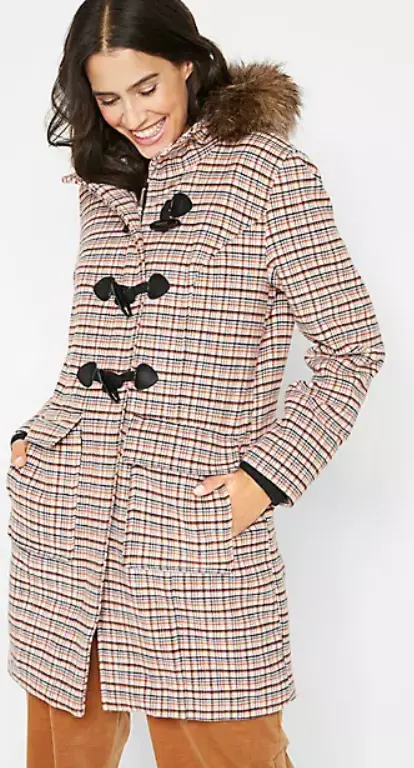 Woman wearing checked duffle coat