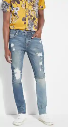Photo by Guess (Skinny Fit Jeans with Abrasions)