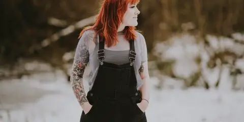 woman wearing black overall with tee
