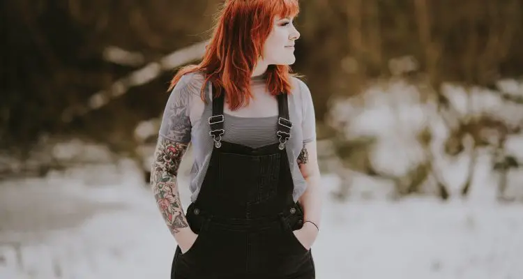 woman wearing black overall with tee