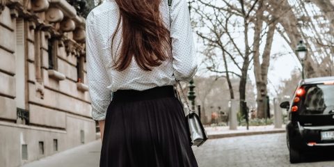 woman wearing Parisian style outfit
